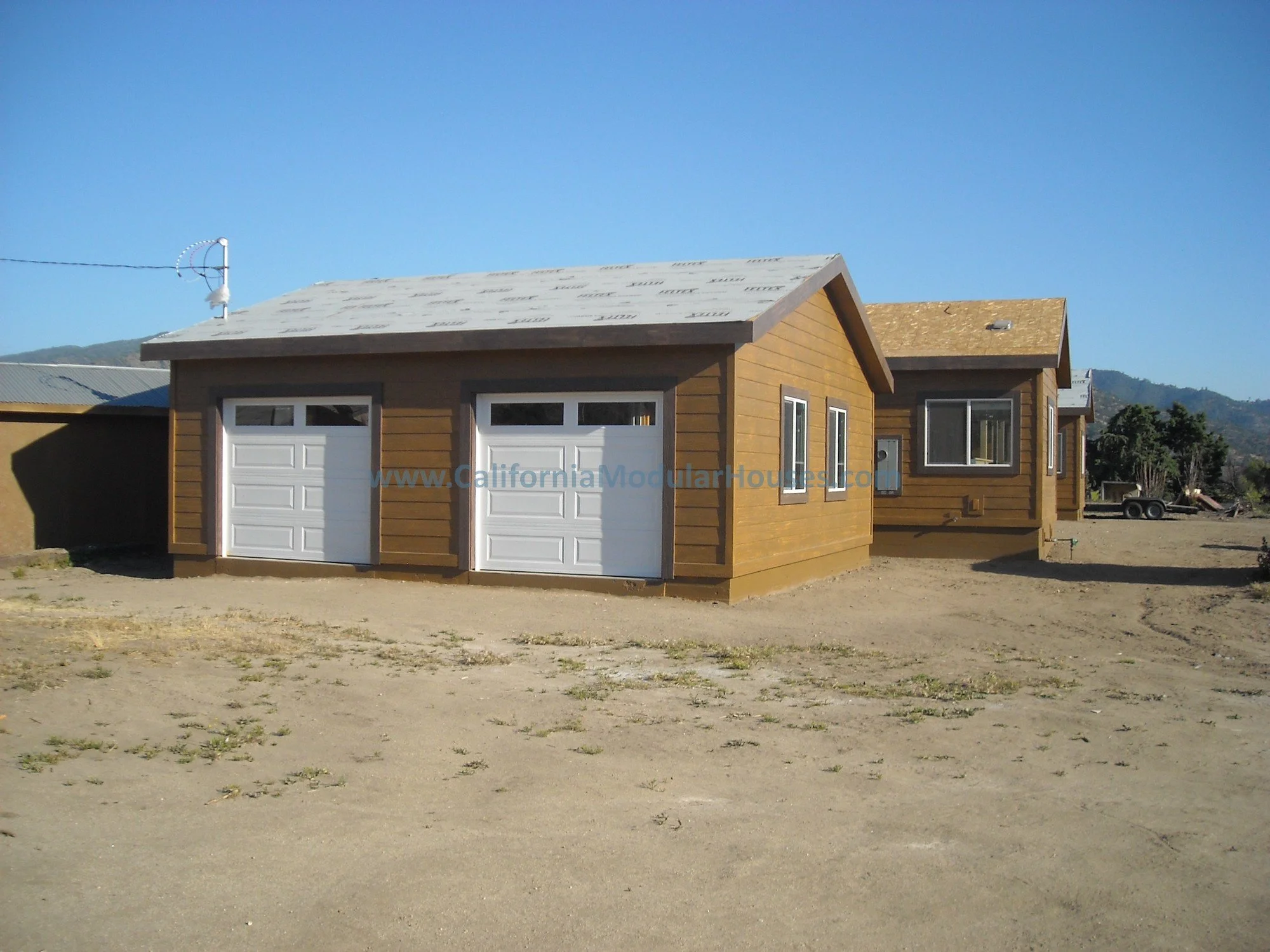 This is the site built garage where the same materials were used to complete the garage so it perfectly matches the home.  It is an over-sized two car garage. 