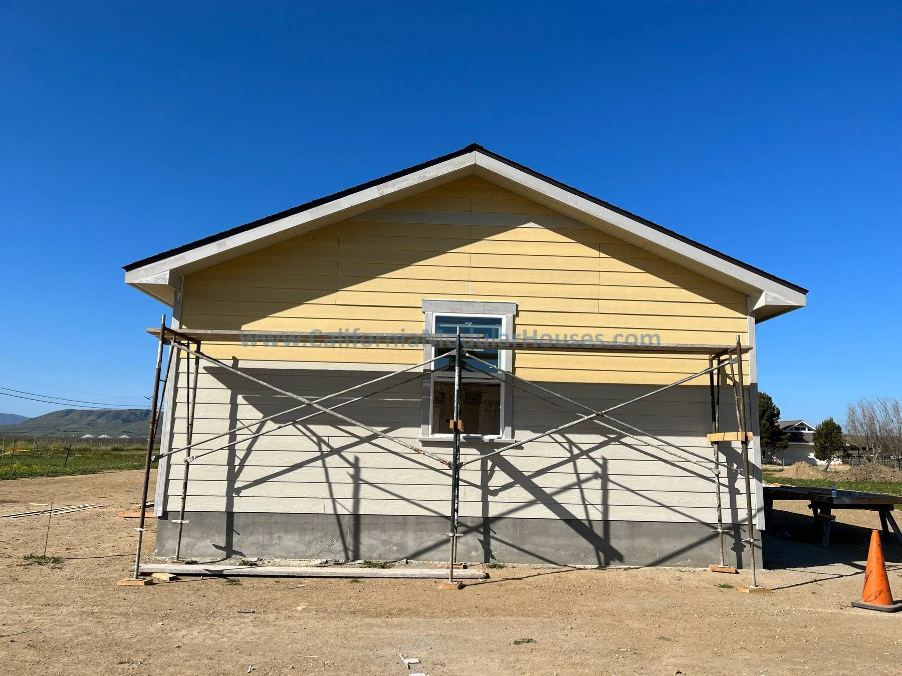 California modular home.  Progress image 2 of site built 3 car garage attached to a modular house.  San Juan Bautista, CA.  