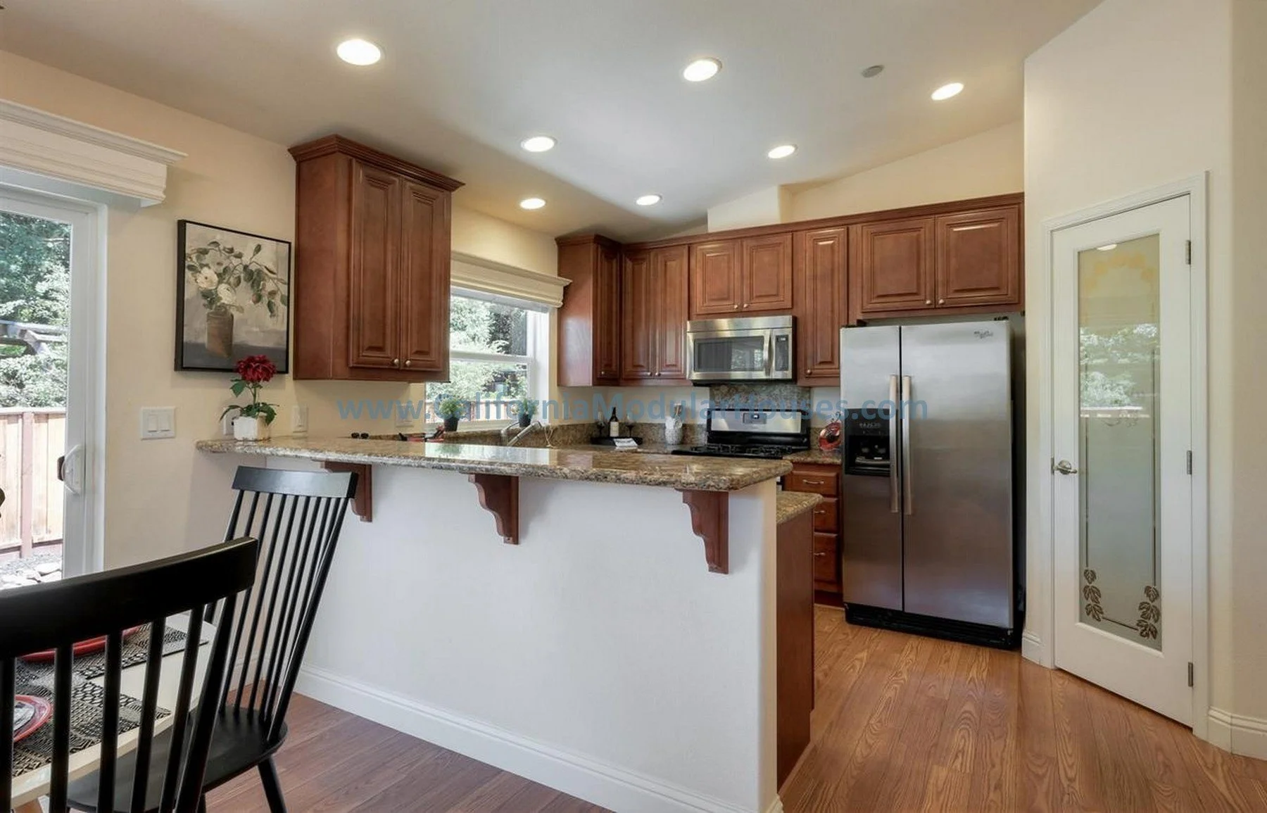 The Teal Interior.  Modular ADU.  Modular Homes.  Modulars for Martinez, Contra Costa County, CA.  Pre-fabricated homes.  Prefab ADU models.  California prefab ADU. Modular.  Prefab Accessory Dwelling Unit.  Kitchen with hardwood cabinets