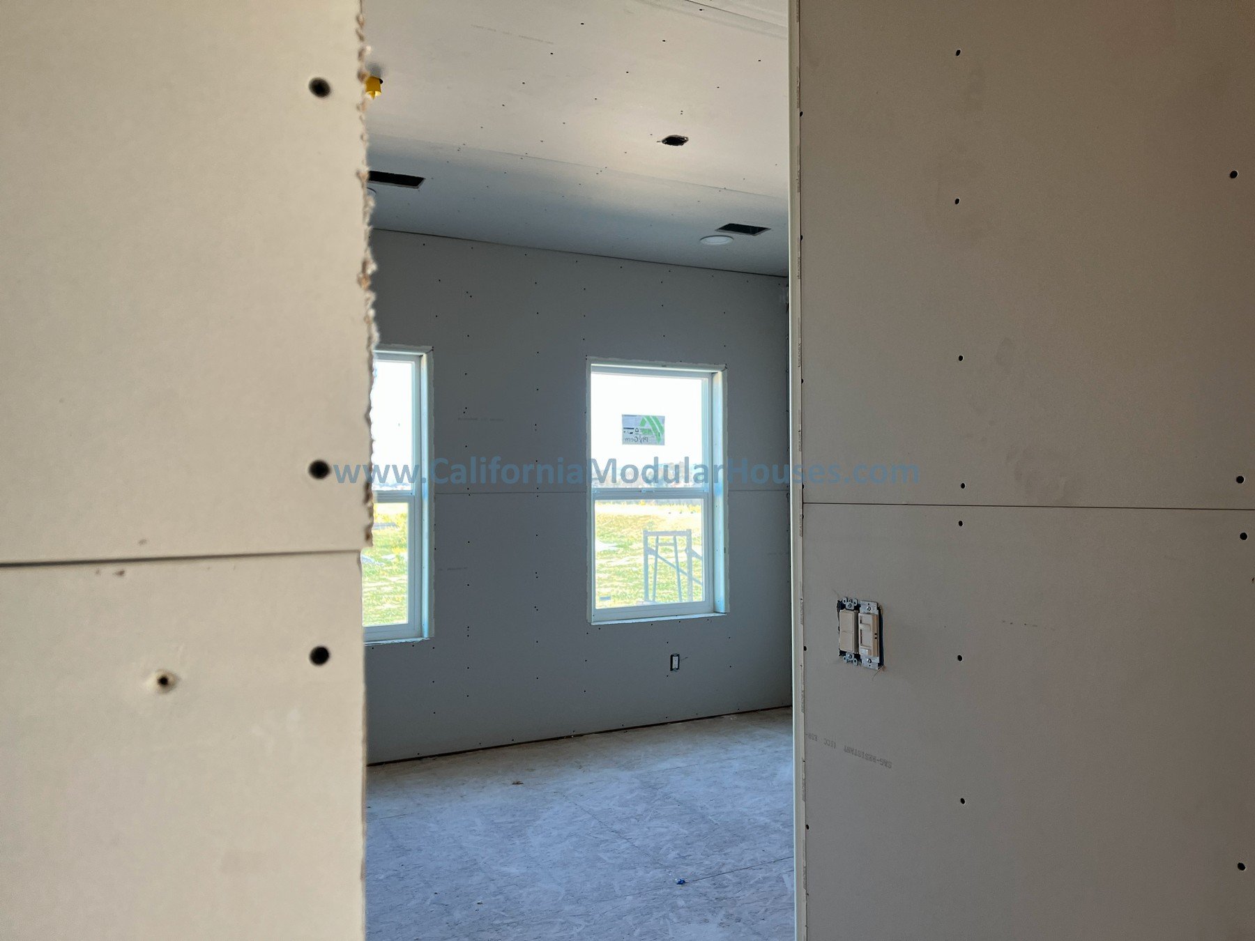 Great room from hallway Interior progress picture of a Factory Built Home for San Juan Bautista, CA. California Modular Houses, Inc. California Modular.  Prefab modular.  Modular Home CA.  