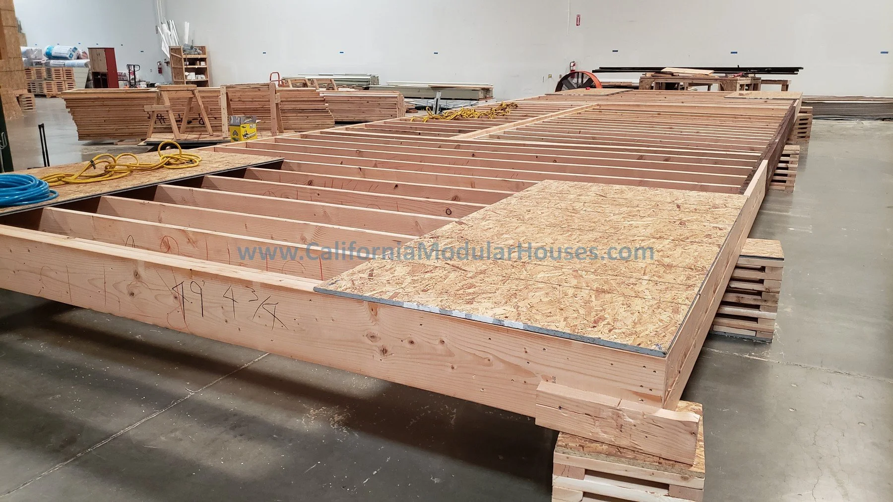 The inner factory workings for a Factory Built Home.  Factory Built Housing.  Framing.  California Modular.  Prefab Modular.  Going to San Juan Bautista.
