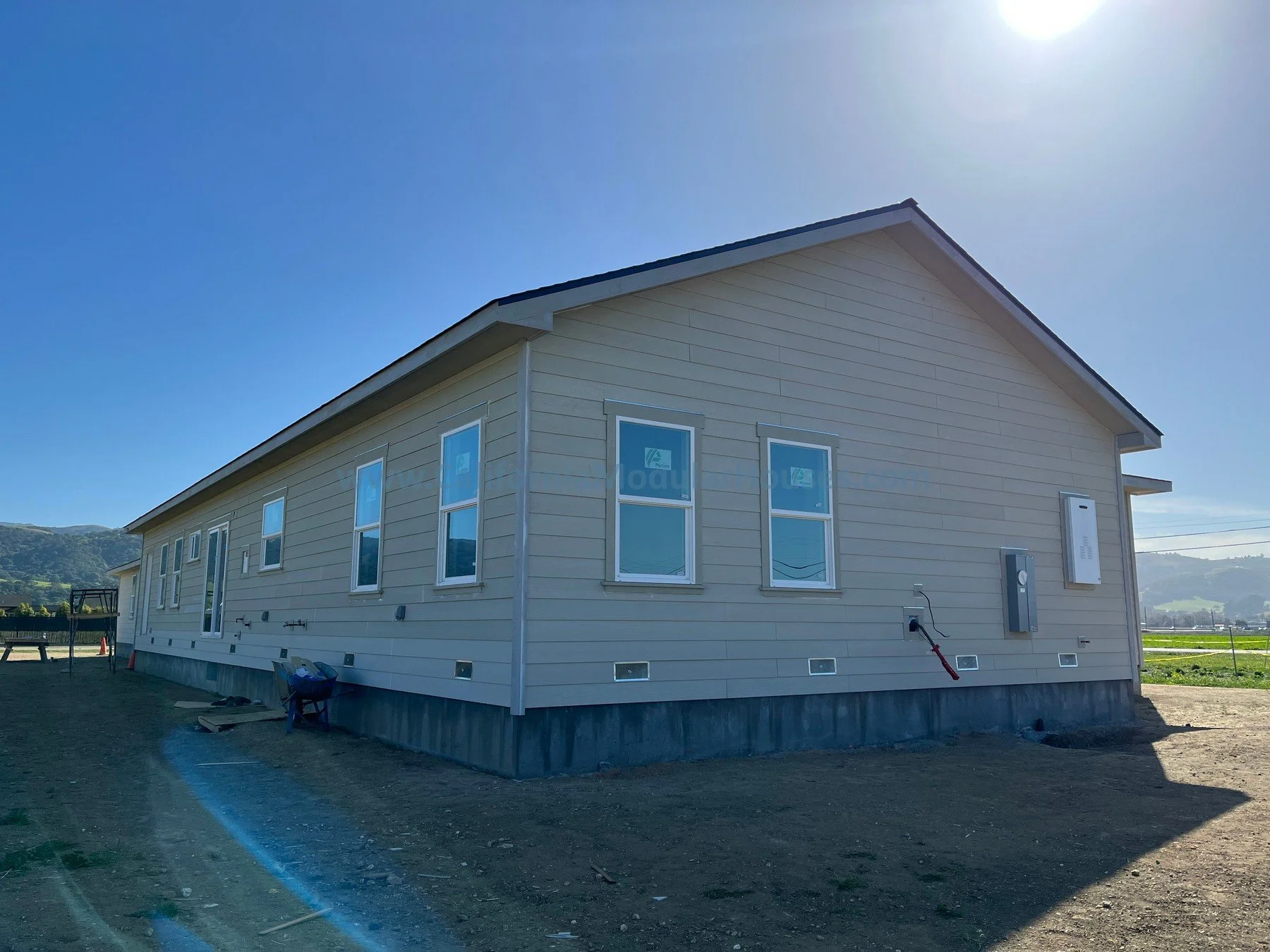 Progress image of a Modular house being completed on-site by the General Contractor  Caliornia  Prefab modular Pre-fab Modulars CA.  