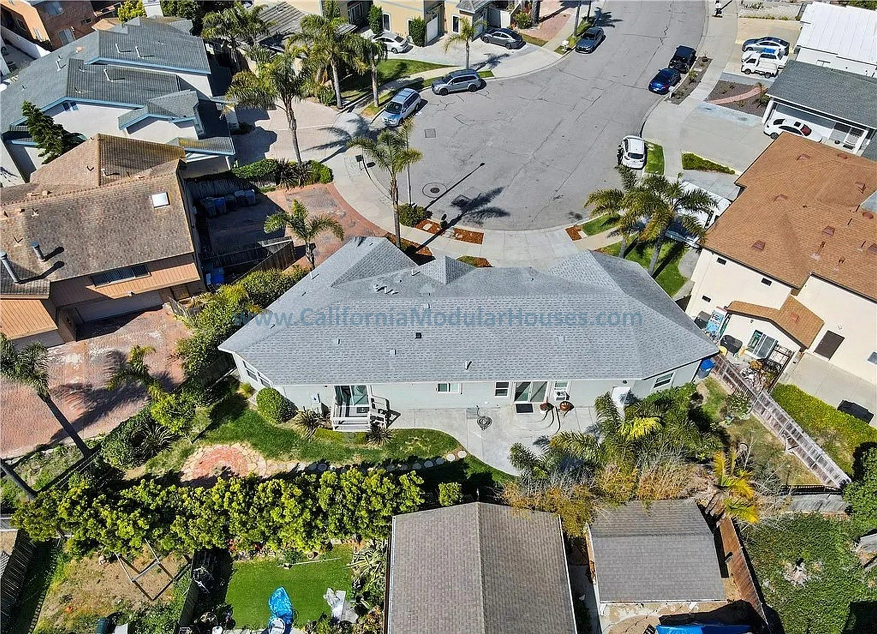 Aerial view of a suburban neighborhood showing this completely custom designed modular home.  California Modular Houses. Pre fab home.  Modular homes for California.  Casas prefabricadas.  Southern California.  