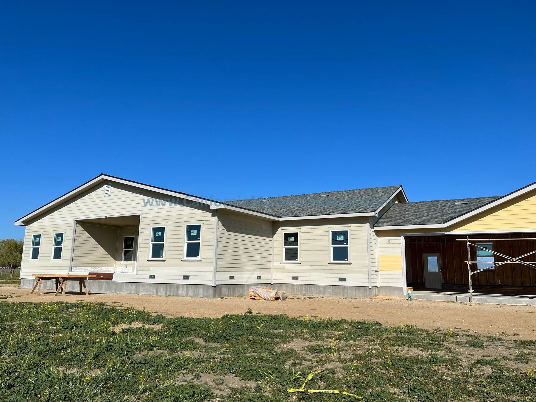 Progress image of a Modular house being completed on-site by the General Contractor  Caliornia  Prefab modular Pre-fab Modulars CA.  