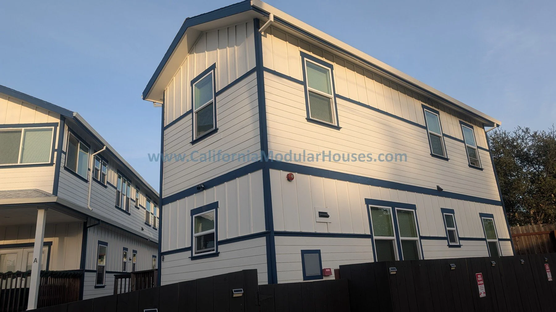 Multiple modern white modular houses.  Two Story Modular Home.  2 Story ADU.  Modular. Modulars.  Prefab.  California.  Contra Costa County, CA.  