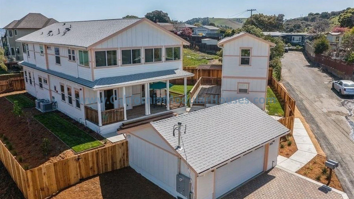 Contra Costa County, CA.  San Francisco Bay.  Modular house for California.  Prefab modular home overview 2 of this home with a large porch and large balcony.  