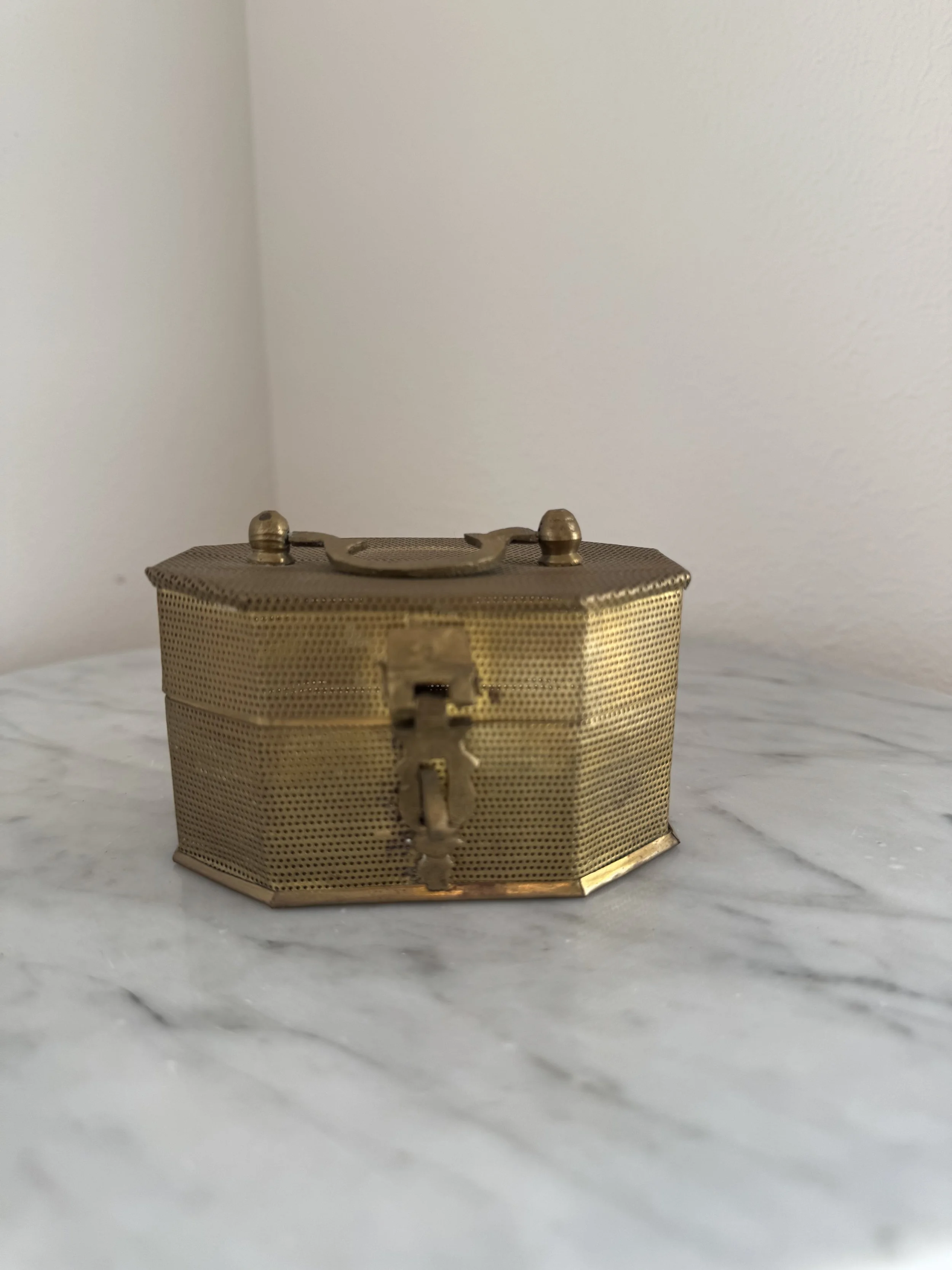Petite Brass Jewelry Box – Octagonal Perforated Form with Handle & Latch