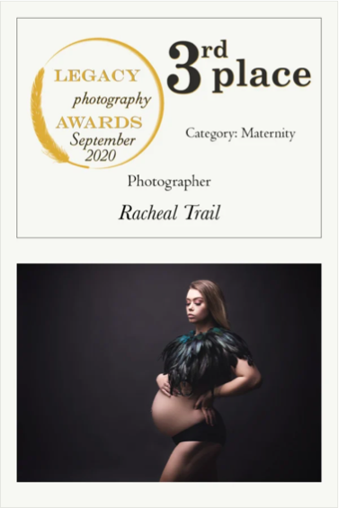 Award certificate for third place in maternity photography category, September 2020, by photographer Racheal Trail; below, a pregnant woman with long hair standing against a dark background, wearing a feathered black garment.