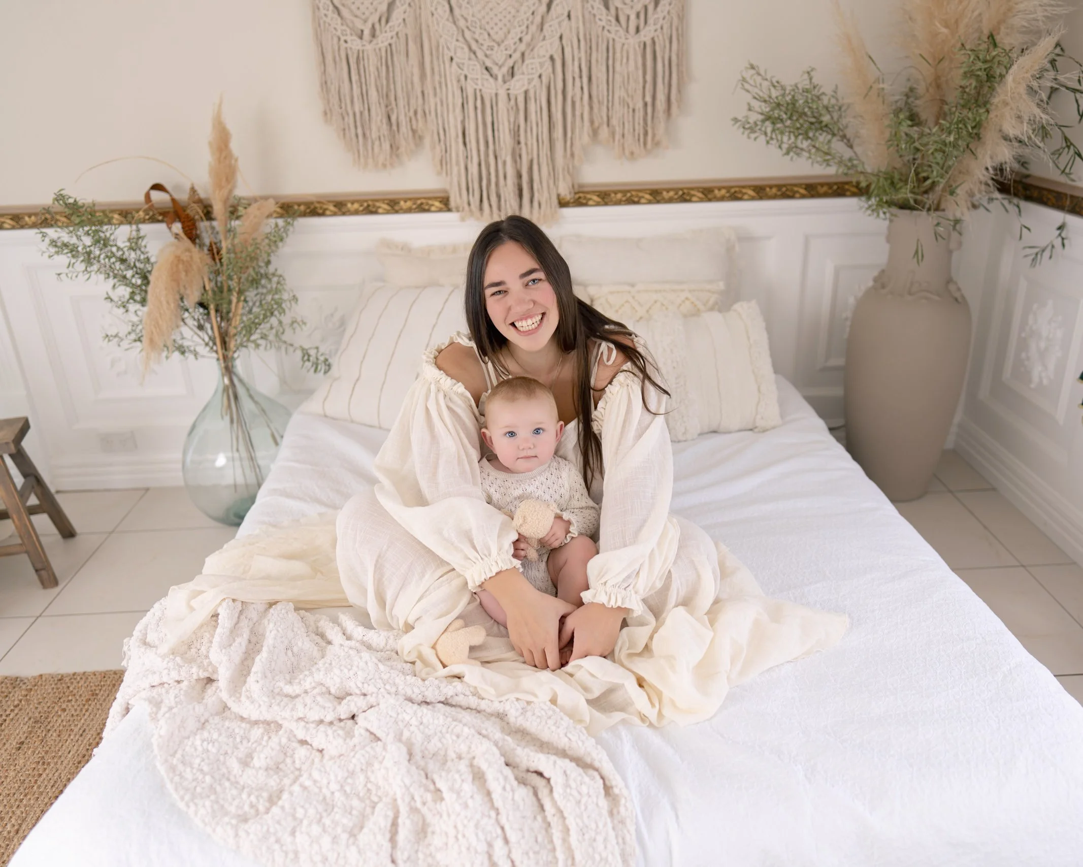 Mum and child photographed together in a relaxed lifestyle studio session in Auckland.