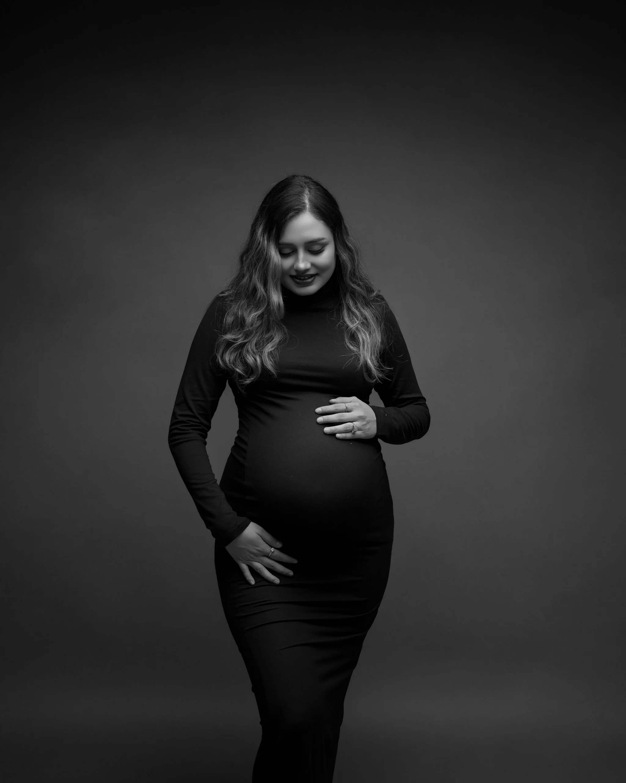 Black and white portrait of a pregnant woman during an Auckland maternity photography session.