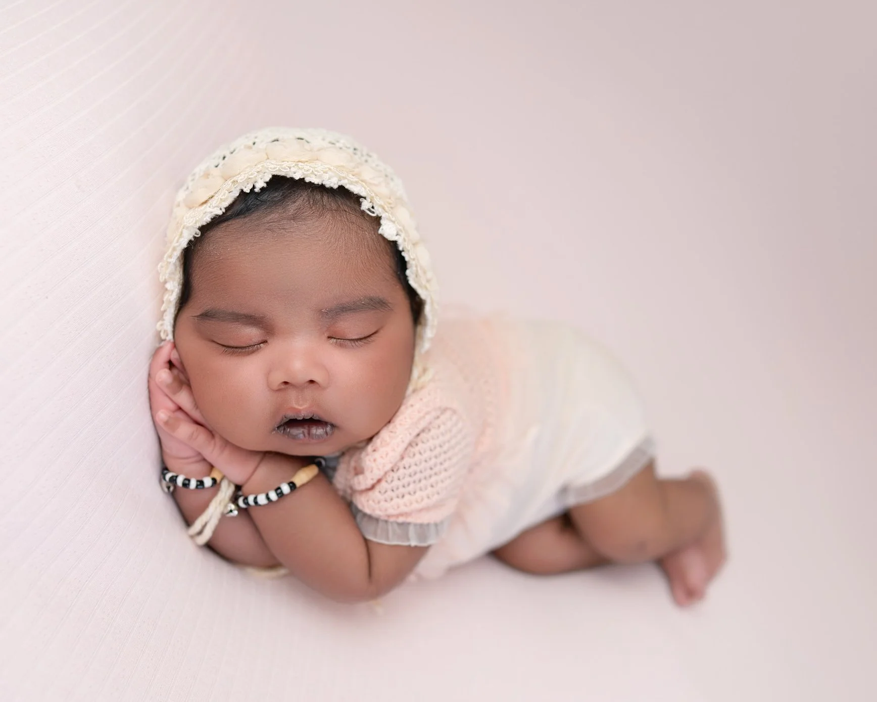 Posed newborn baby photographed at home during a split newborn photography session in Auckland