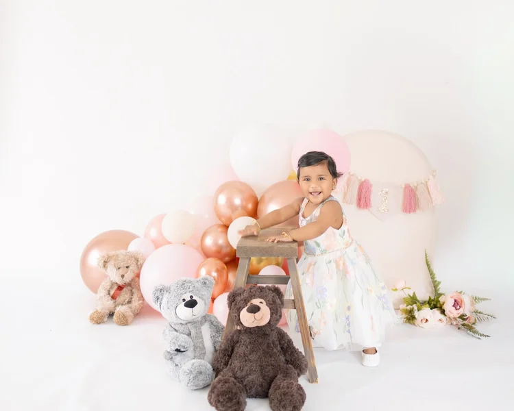 Baby girl celebrating her first birthday during an Auckland milestone photoshoot