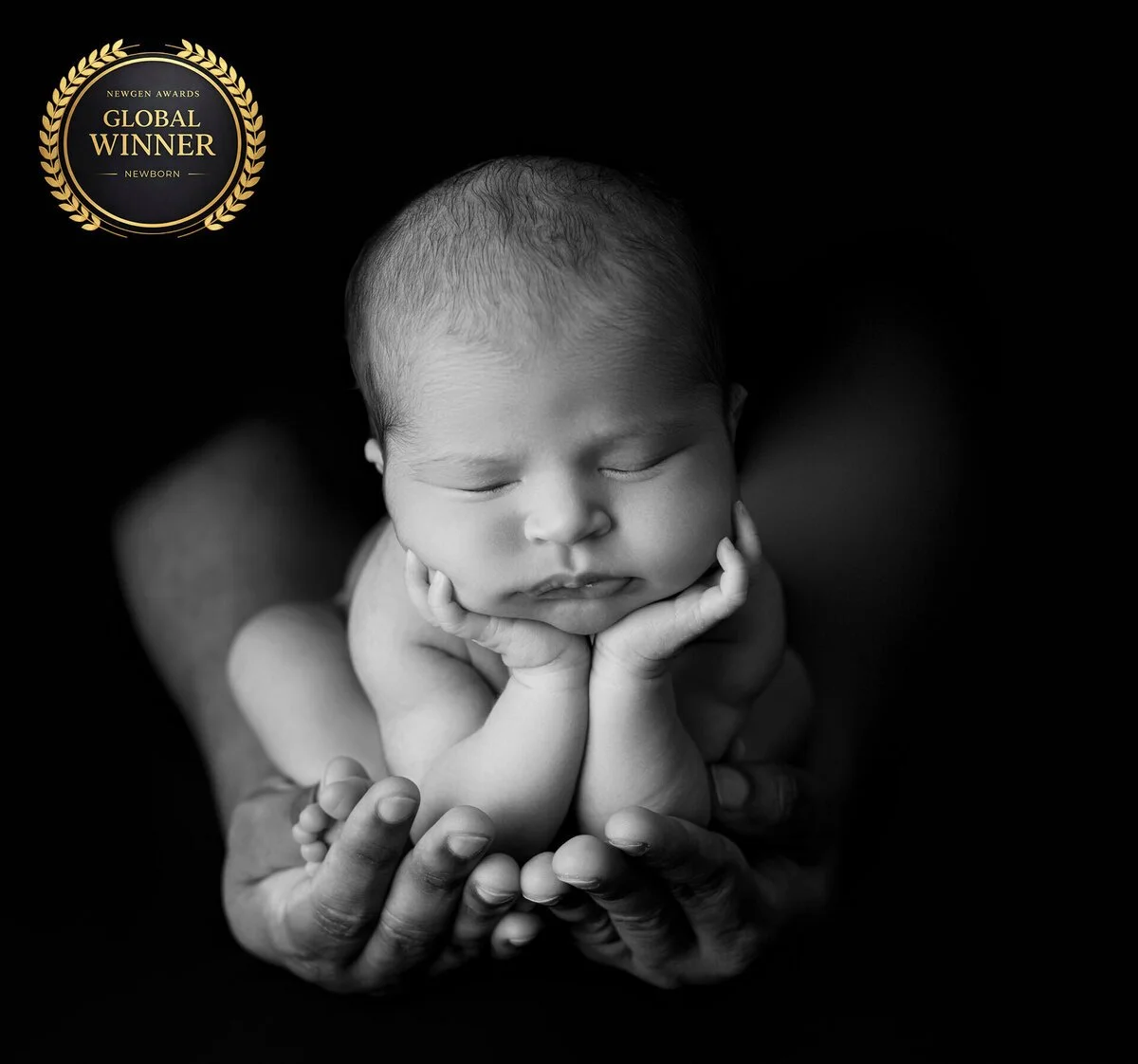Sleeping newborn baby wrapped in a cream knit wrap during an award-winning studio newborn photography session in South Auckland by Racheal Trail Photography.