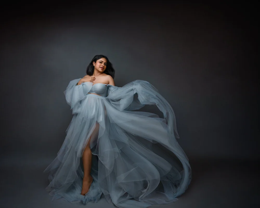 Auckland maternity portrait with flowing blue tulle gown