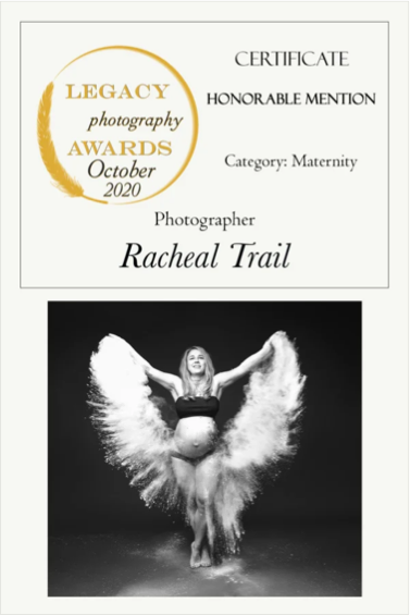 A certificate for an honorable mention in maternity photography awards, October 2020, awarded to photographer Rachael Trail, featuring a black and white pregnancy photo of a woman with wings, standing with arms outstretched.