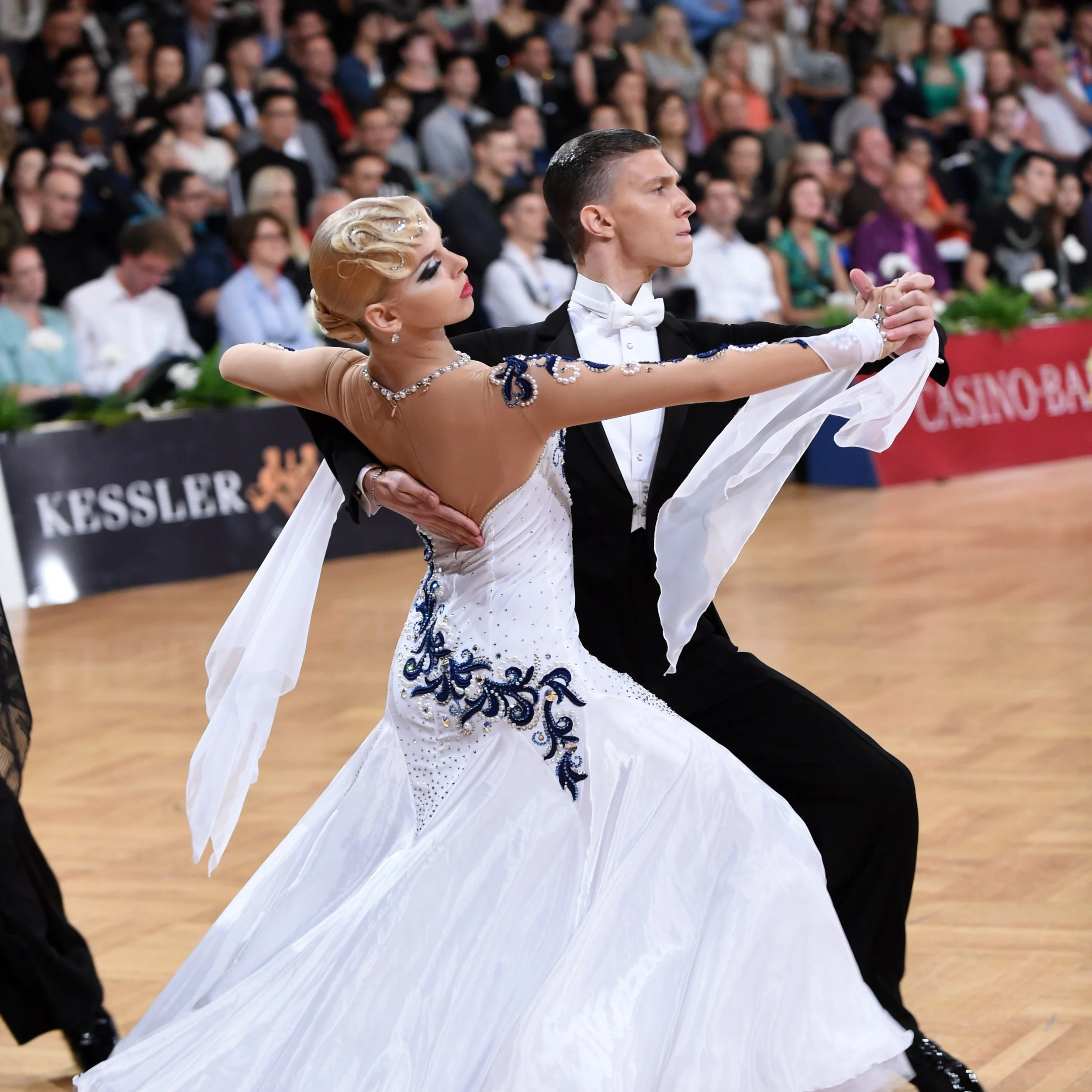A ballroom dance couple performing