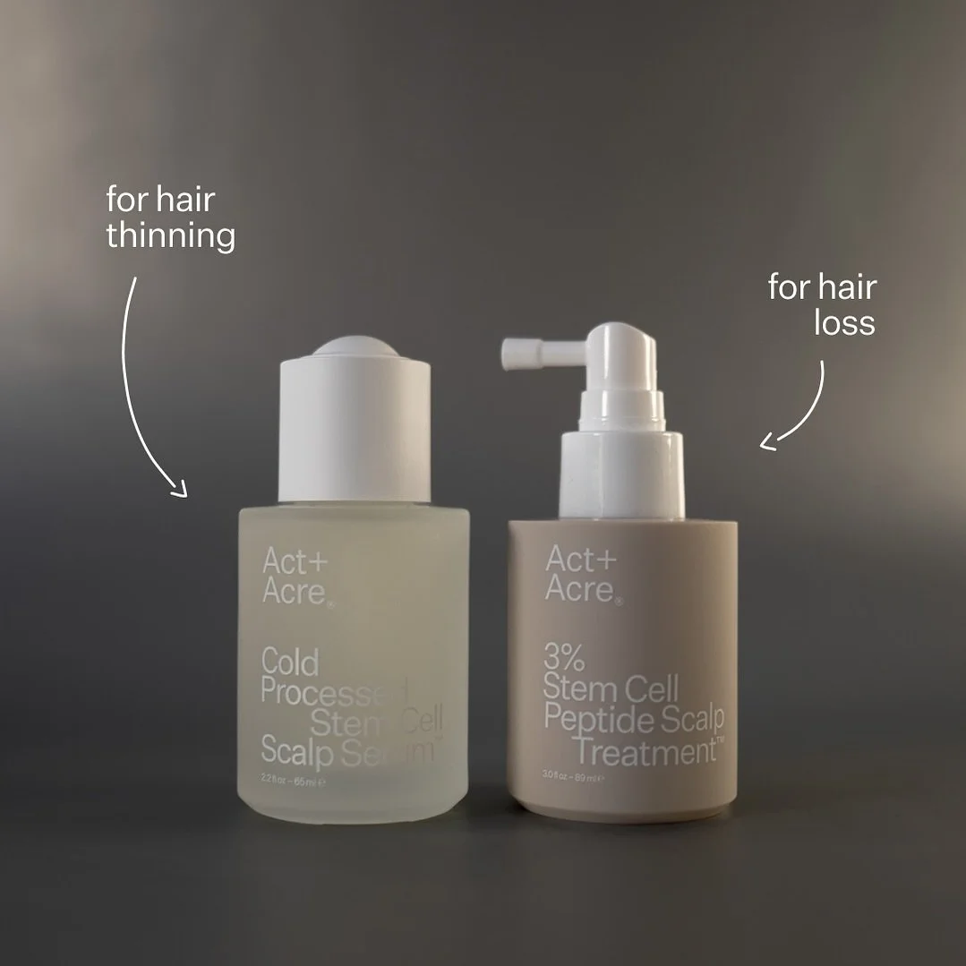 Two bottles of hair treatment products, one labeled for hair thinning and the other for hair loss, against a plain background.