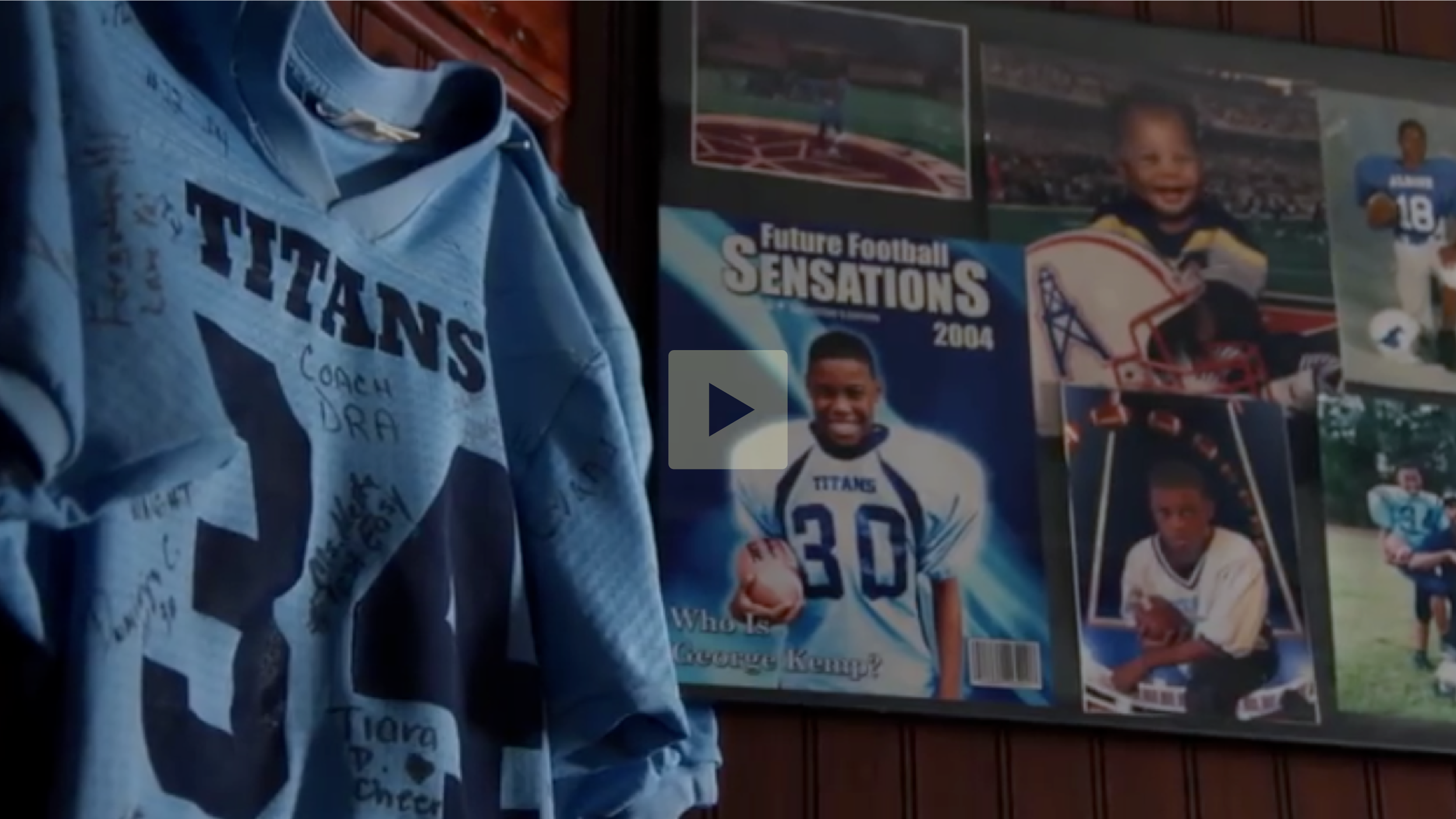 A blue football jersey with 'TITANS' across the chest and various signatures hanging on a wall, surrounded by posters of a young football player, a magazine cover, and photographs of the player at different ages.