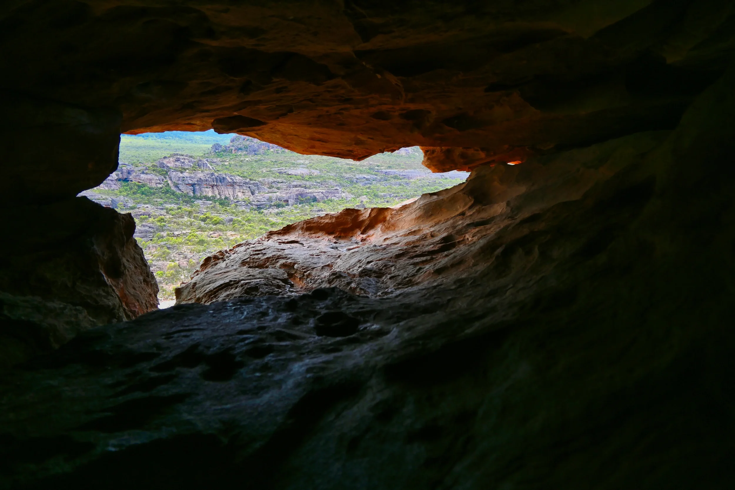 A breathtaking view of the mountain ranges from inside a cave at Grampians National Park (Gariwerd) in Victoria, Australia.