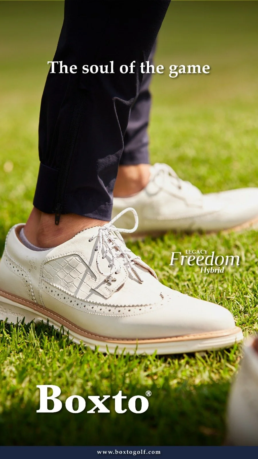Close-up of a person wearing white golf shoes and black athletic pants on the grass, with text overlay promoting Boxto golf shoes, highlighting model 'Legacy Freedom Hybrid'.