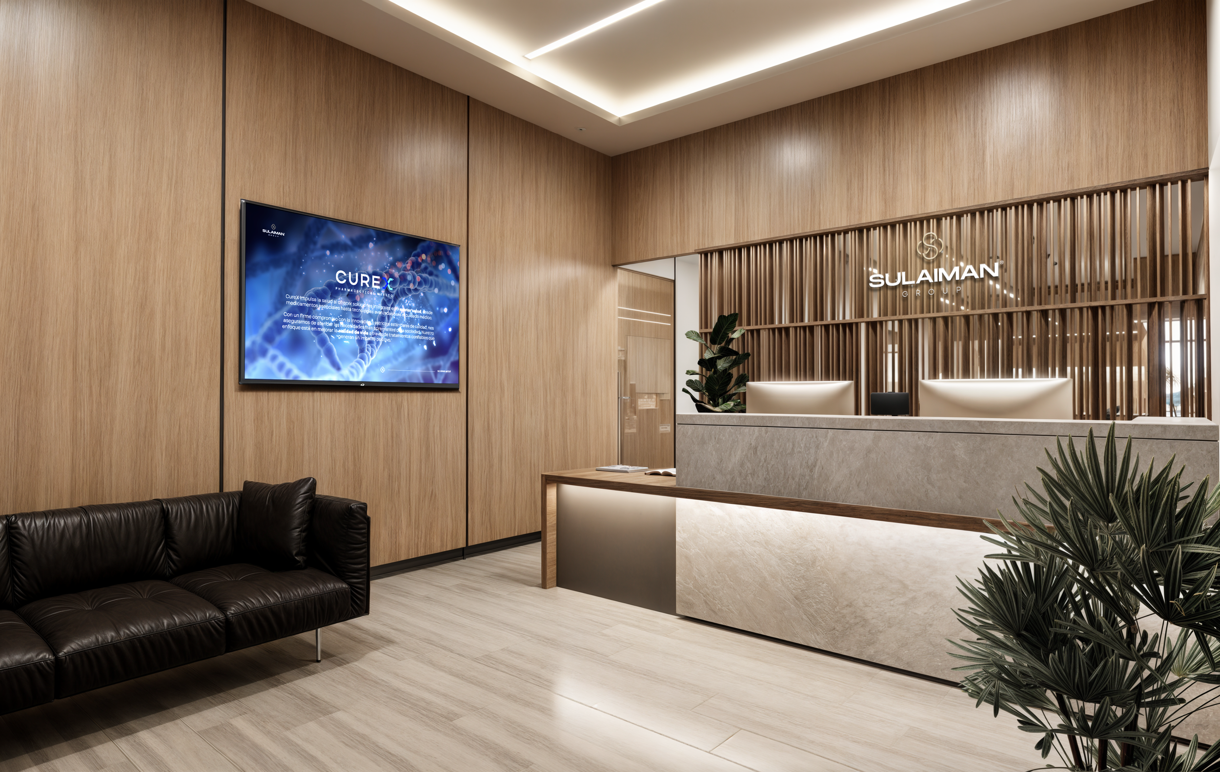 Modern reception area with a black leather sofa, a wooden wall with a mounted digital display, a sleek reception desk with a marble finish, a green plant near the desk, and a wooden slatted partition behind the desk with the sign 'SULAIMAN GROUP' ill