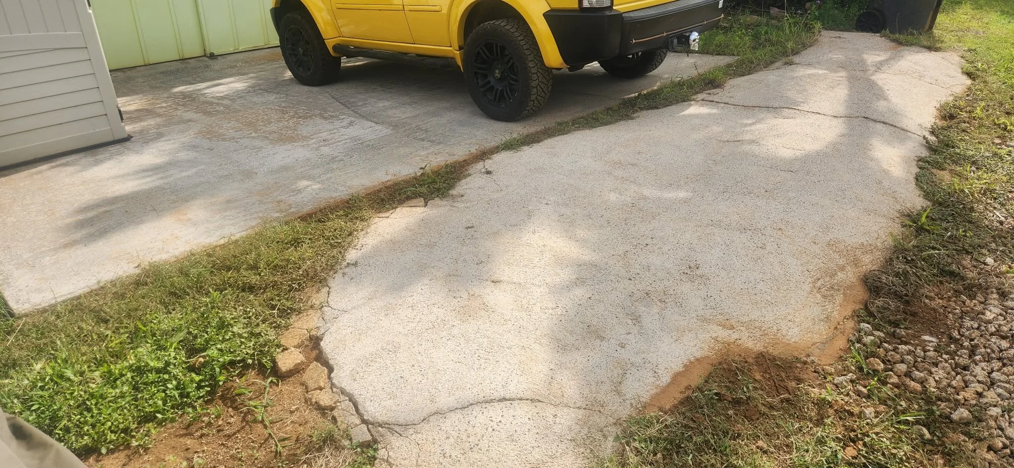 After we softwashed and pressure washed this driveway!