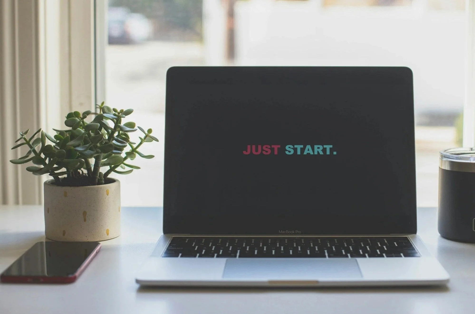 just start adhd and perimenopause overwhelm reset challenge free guide on laptop desk jade plant window with curtains