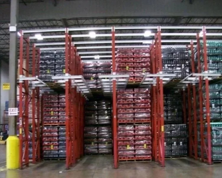 Warehouse two-wide racking filled with plastic bottles.