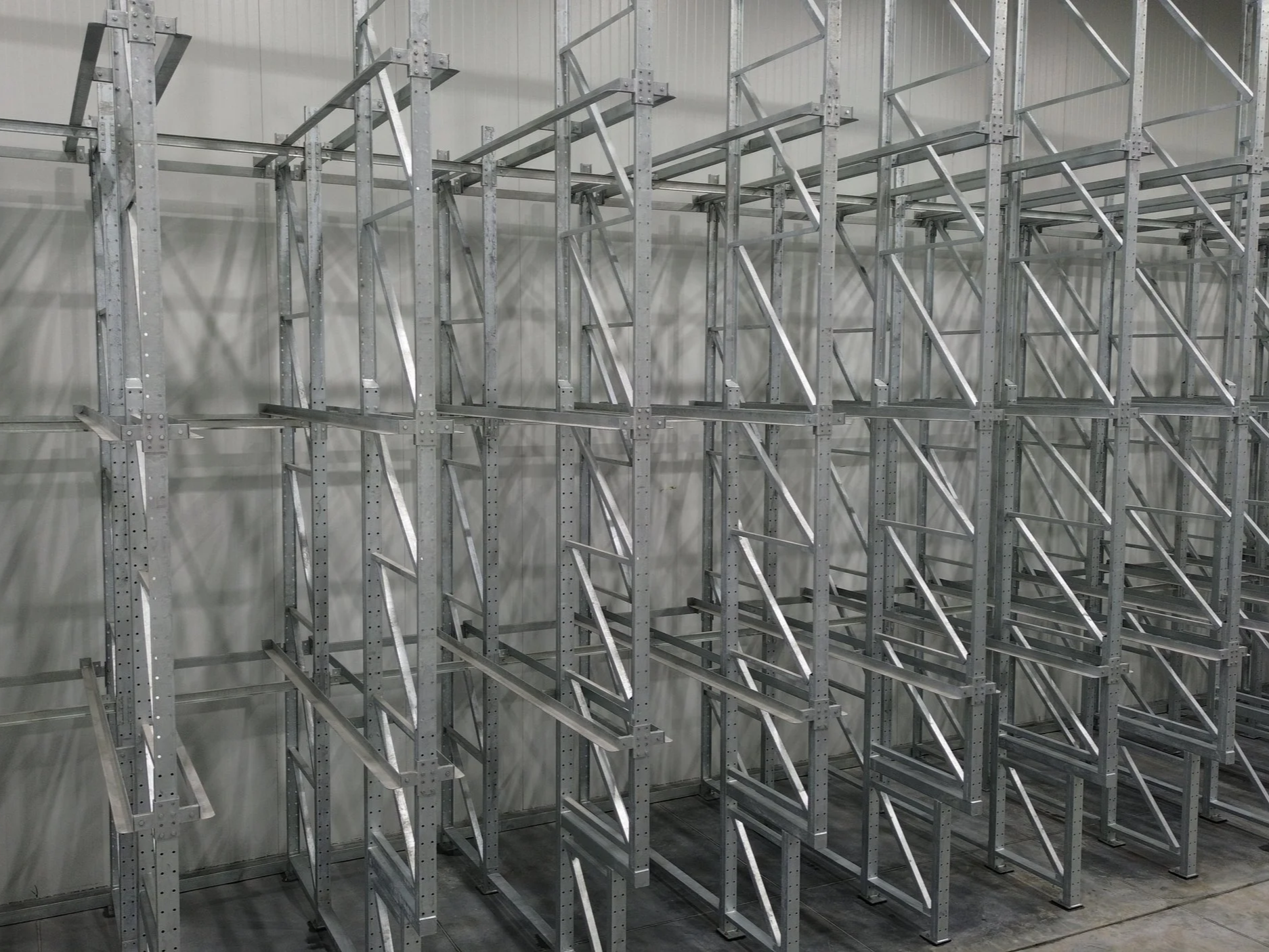 Empty metal shelving drive-in racking.