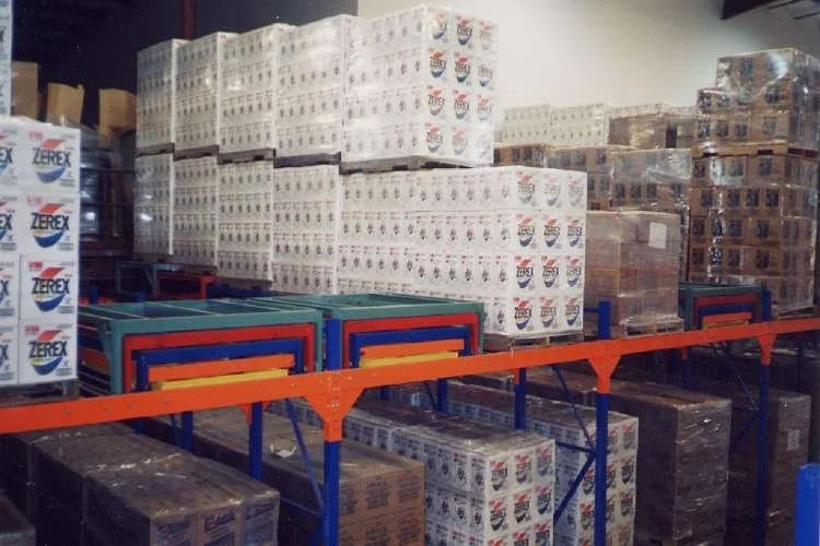 Stacks of boxes on pushback racking.