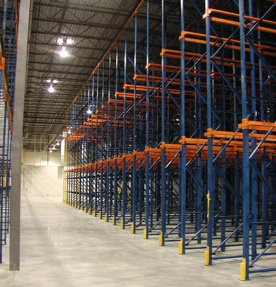 A view of drive-in racking from a warehouse aisle.