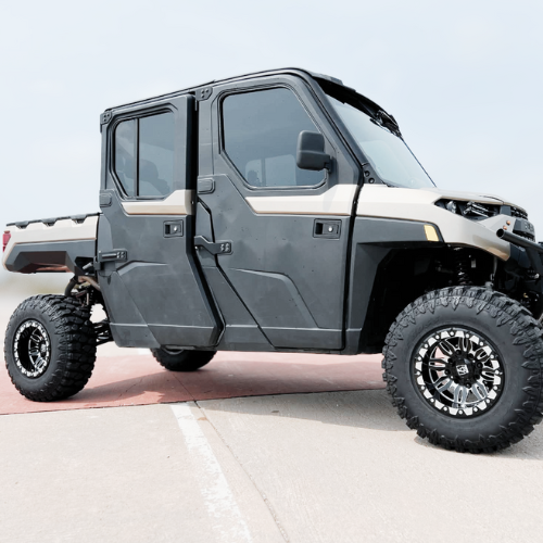 Polaris Ranger 1000 with 2-inch lift kit and Axe wheels installed by Pence Motorsports