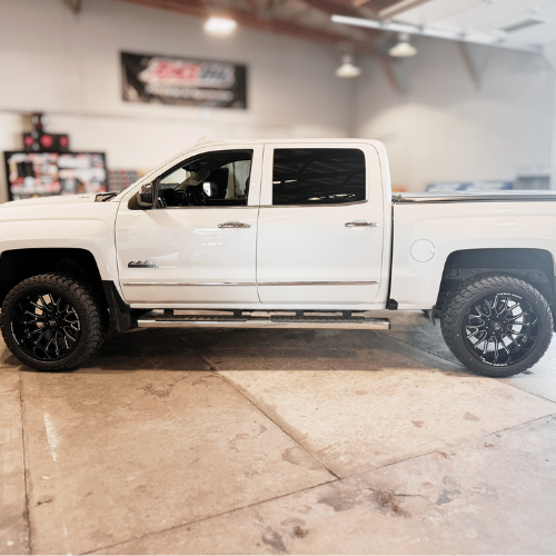 Chevy truck with 20-inch Axe wheels installed by Pence Motorsports