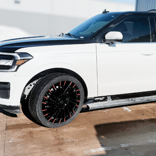 Ford Expedition with custom Lexani forged wheels and Venom tires installed by Pence Motorsports