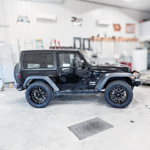 Jeep with 20-inch Built wheels and AMP tires installed by Pence Motorsports