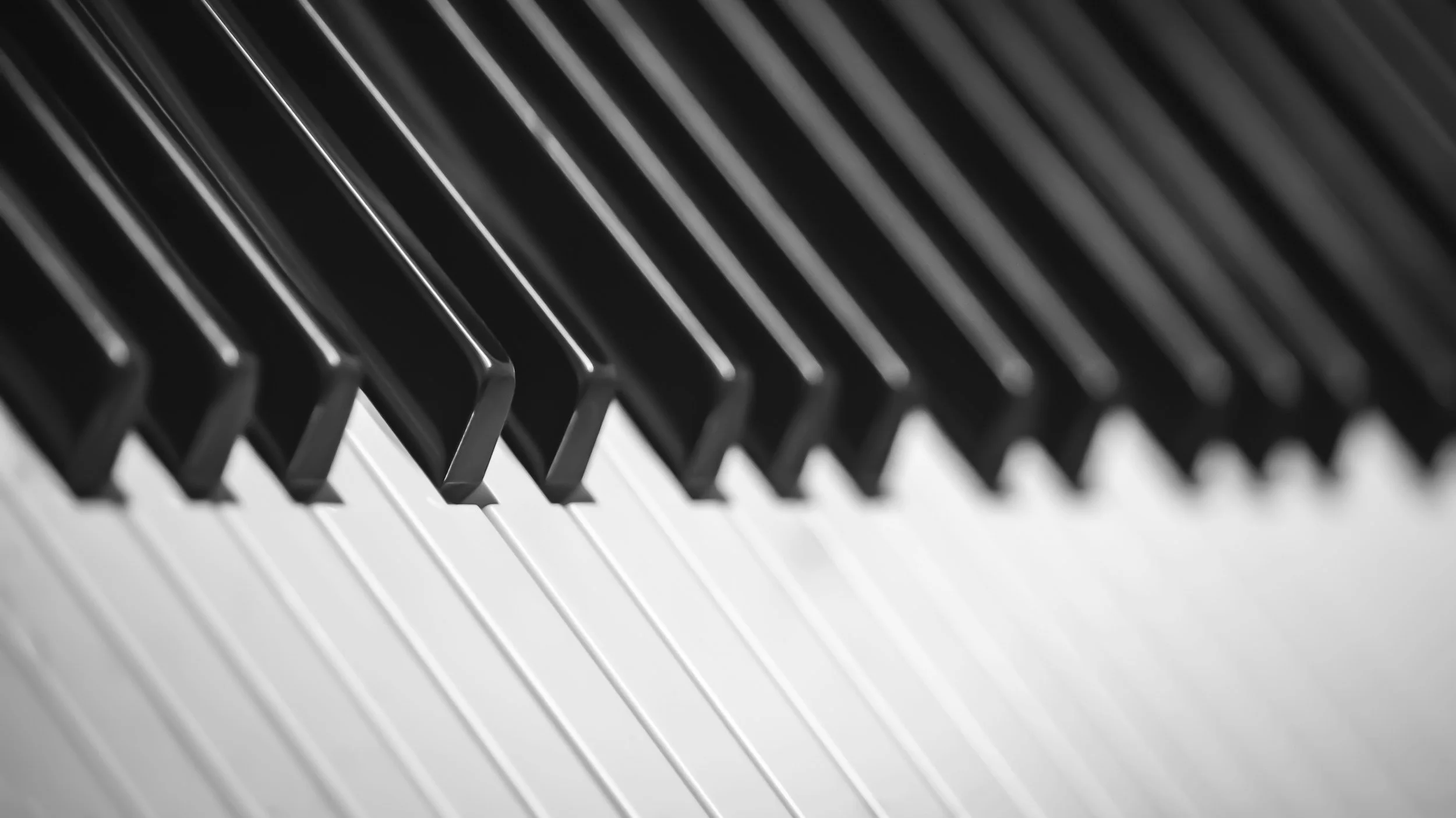 Close-up of black and white piano keys.