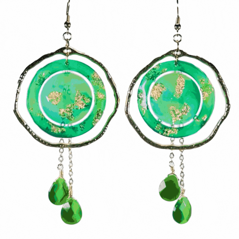 Green and silver circular earrings with dangling green teardrop beads.