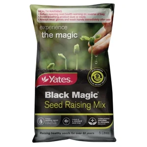A 5-liter bag of Yates Black Magic Seed Raising Mix with small sprouting seedlings on the front.