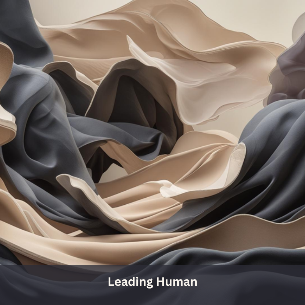 Abstract swirling layers of fabric in shades of beige, gray, and black creating a flowing, textured appearance.