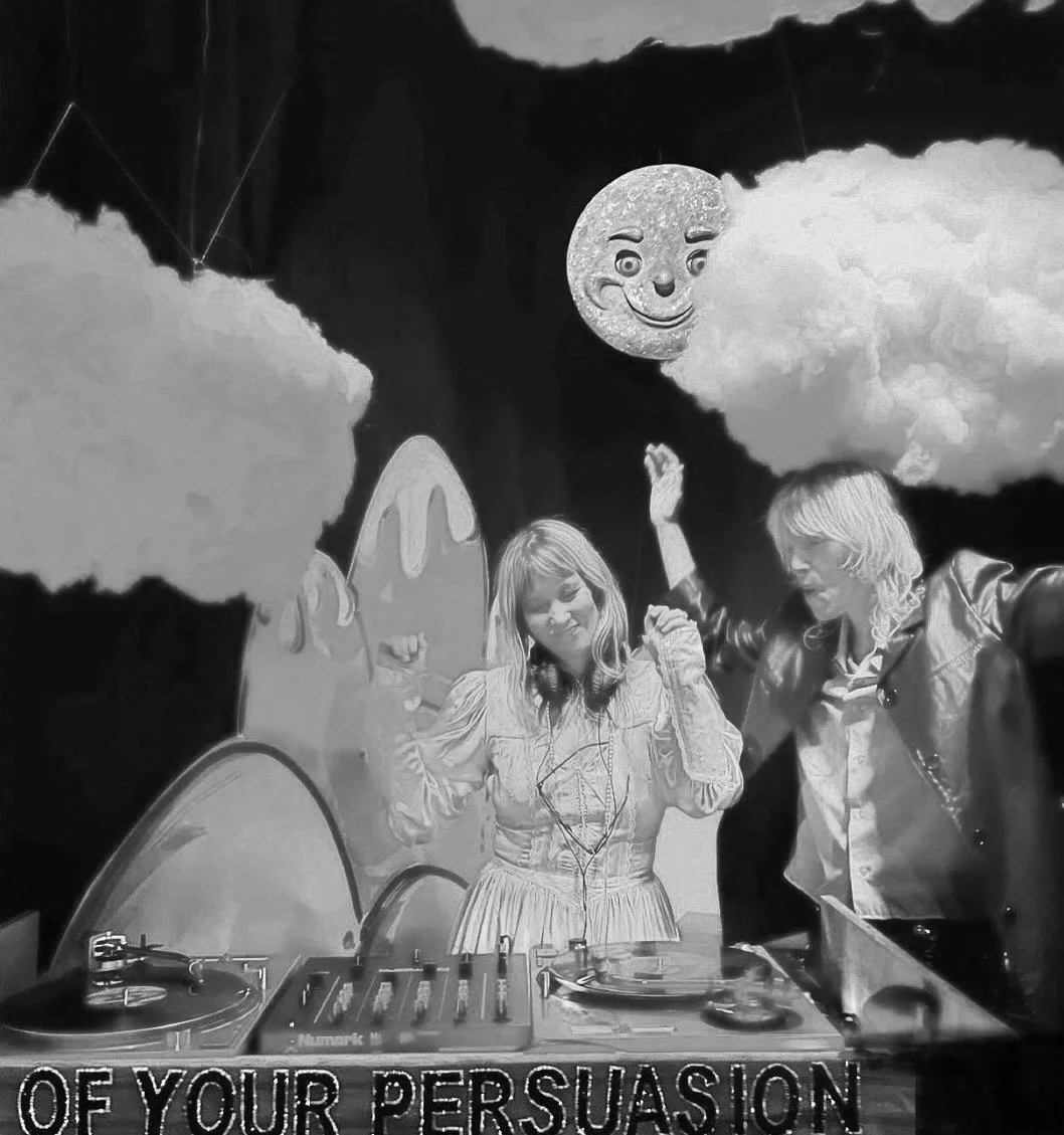 Two people are dancing in front of a black backdrop with clouds and a smiling moon face decoration. There is a DJ turntable and mixer in front, gen x DJ duo Dash and Sera Club Angel Stuff entertaining at an after hours adult event at Bob Baker theate