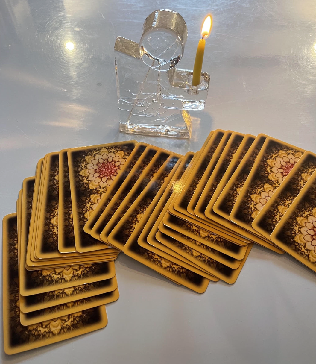 ANGEL CARDS TO BE USED DURING A GUIDANCE SESSION WITH ANGEL CANDLE HOLDER AND LIT CANDLE