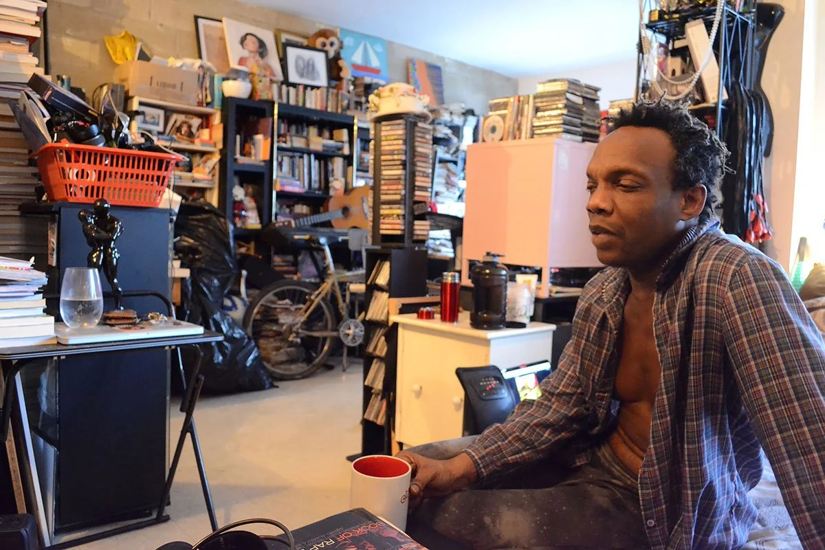 Malcolm Lovejoy chatting in his apartment