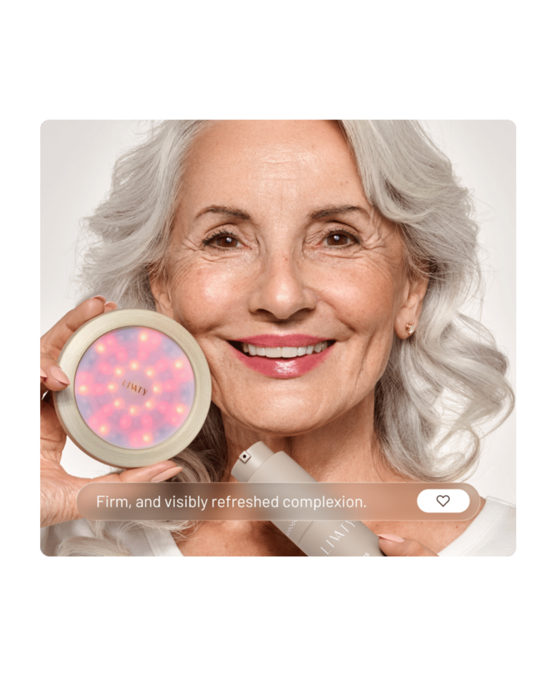 Smiling elderly woman holding a skincare device emitting pink and red lights, with a skincare product in her other hand, text overlay reads "Firm, and visibly refreshed complexion."