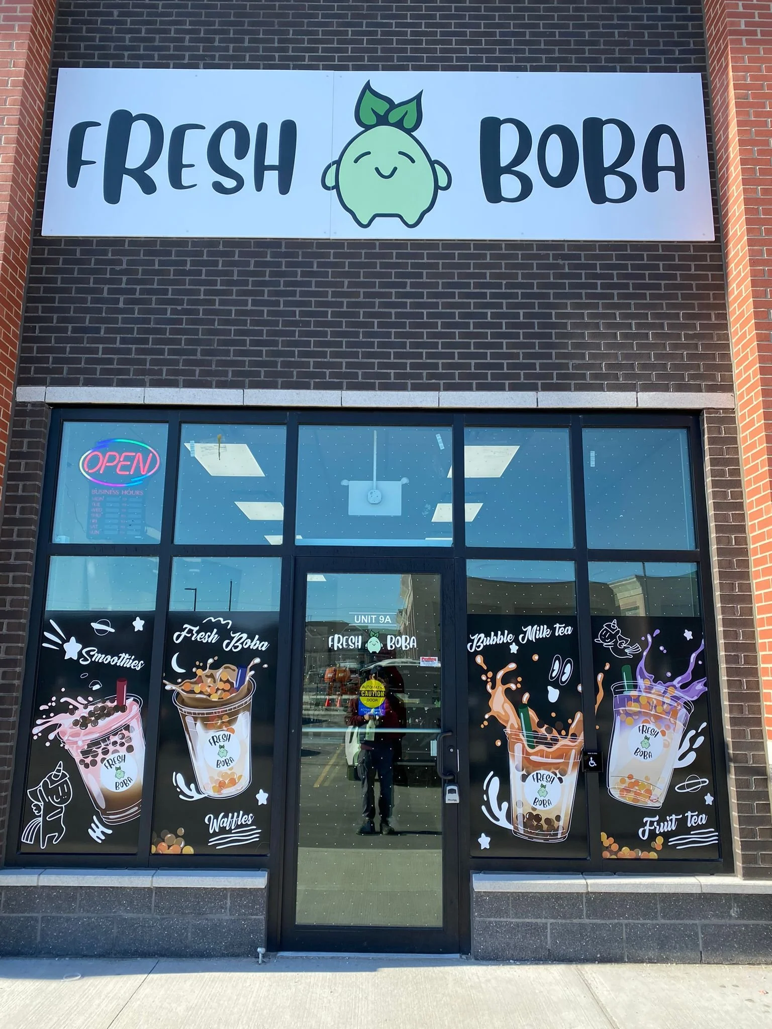 store front sign and window graphics