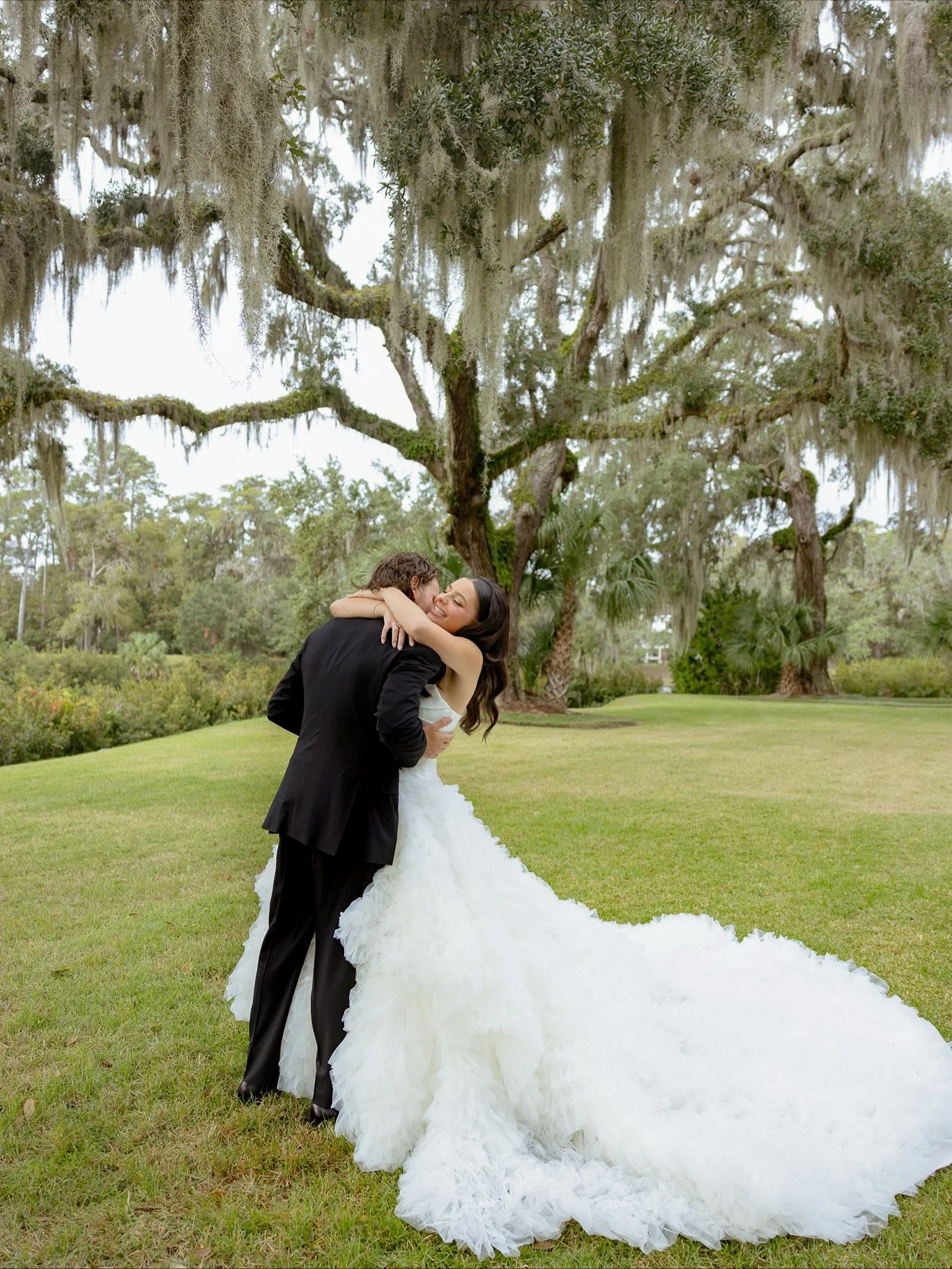 bringing back the most perfect, romantic dress on the grounds of palmetto bluff 🦢 

🦢 

second shot for @lisastaffphoto