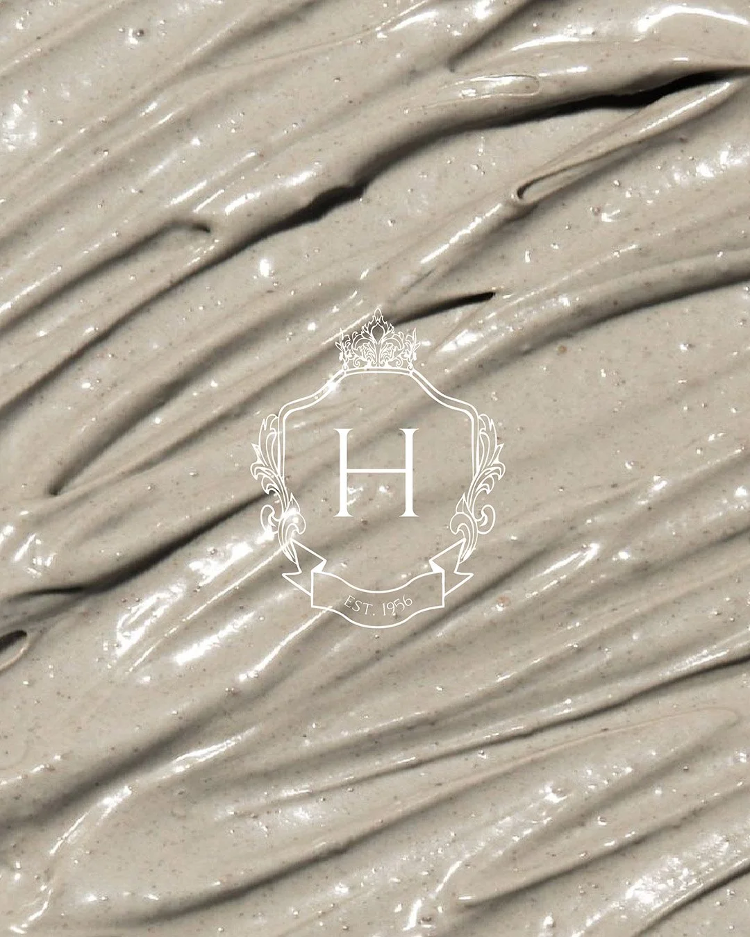 Heritage Club logo over wellness beauty creme.