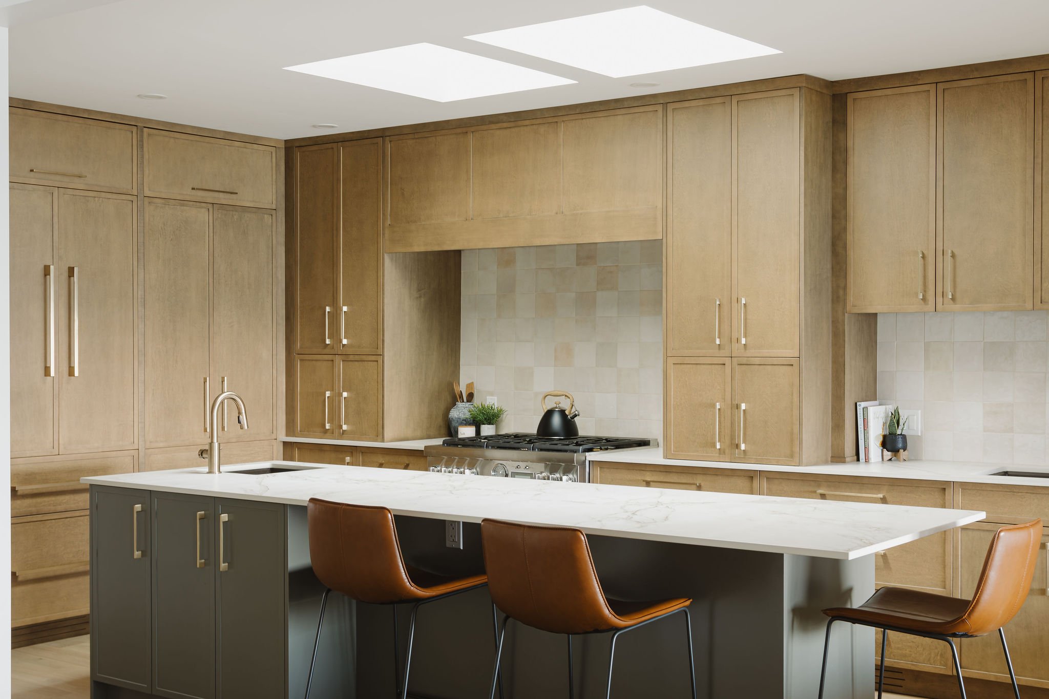 Built in hood surround, Maple Cabinetry, Green Island Cabinetry with prep sink, Dekton Entzo Countertop