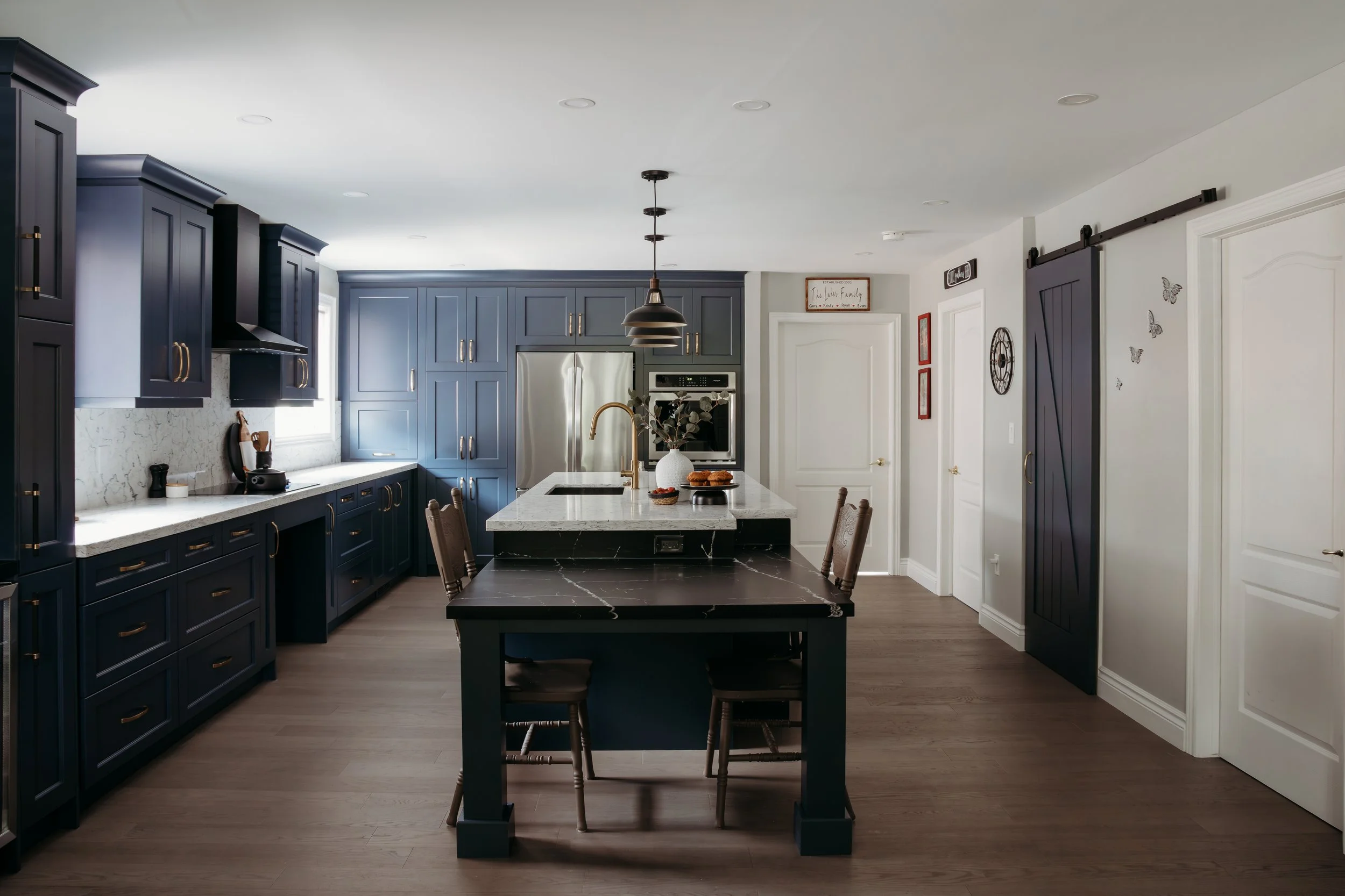 Table attached to island, black matte quartz