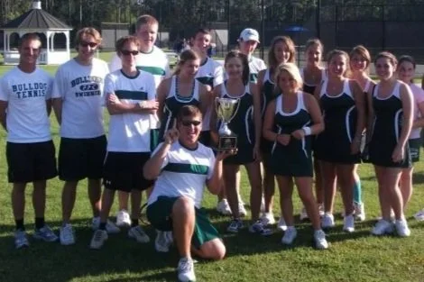 Picking back up the racquet.