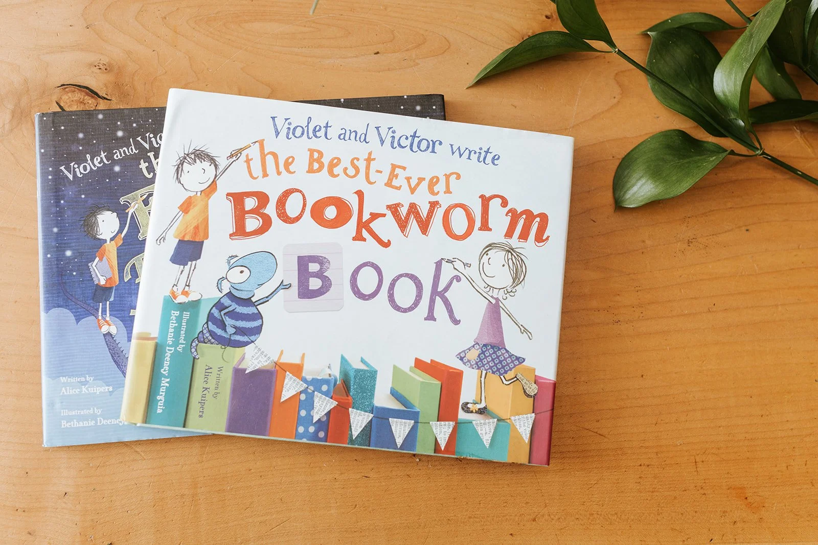 Alice Kuipers author Violet and Victor Series books on table